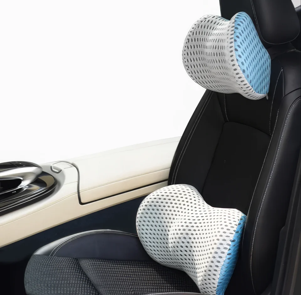 Blue and gray headrest pillow and matching lumbar cushion on a car seat