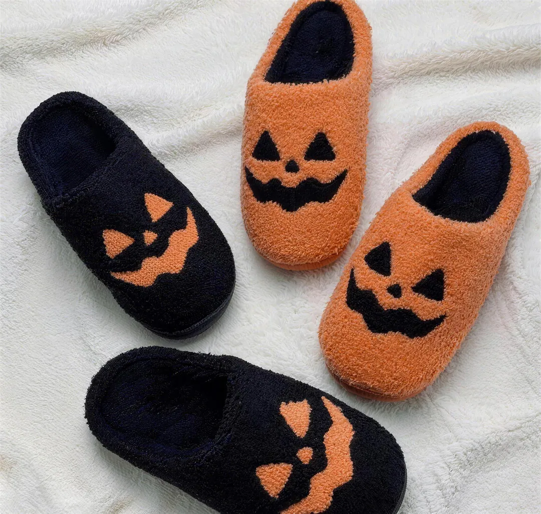 Orange and black pumpkin-face Halloween slippers