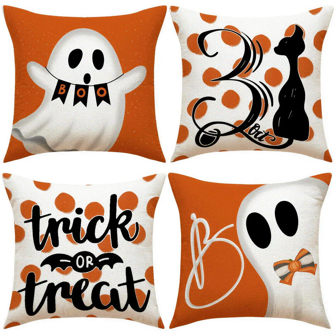 Four Halloween pillow covers with ghost, black cat and trick-or-treat prints